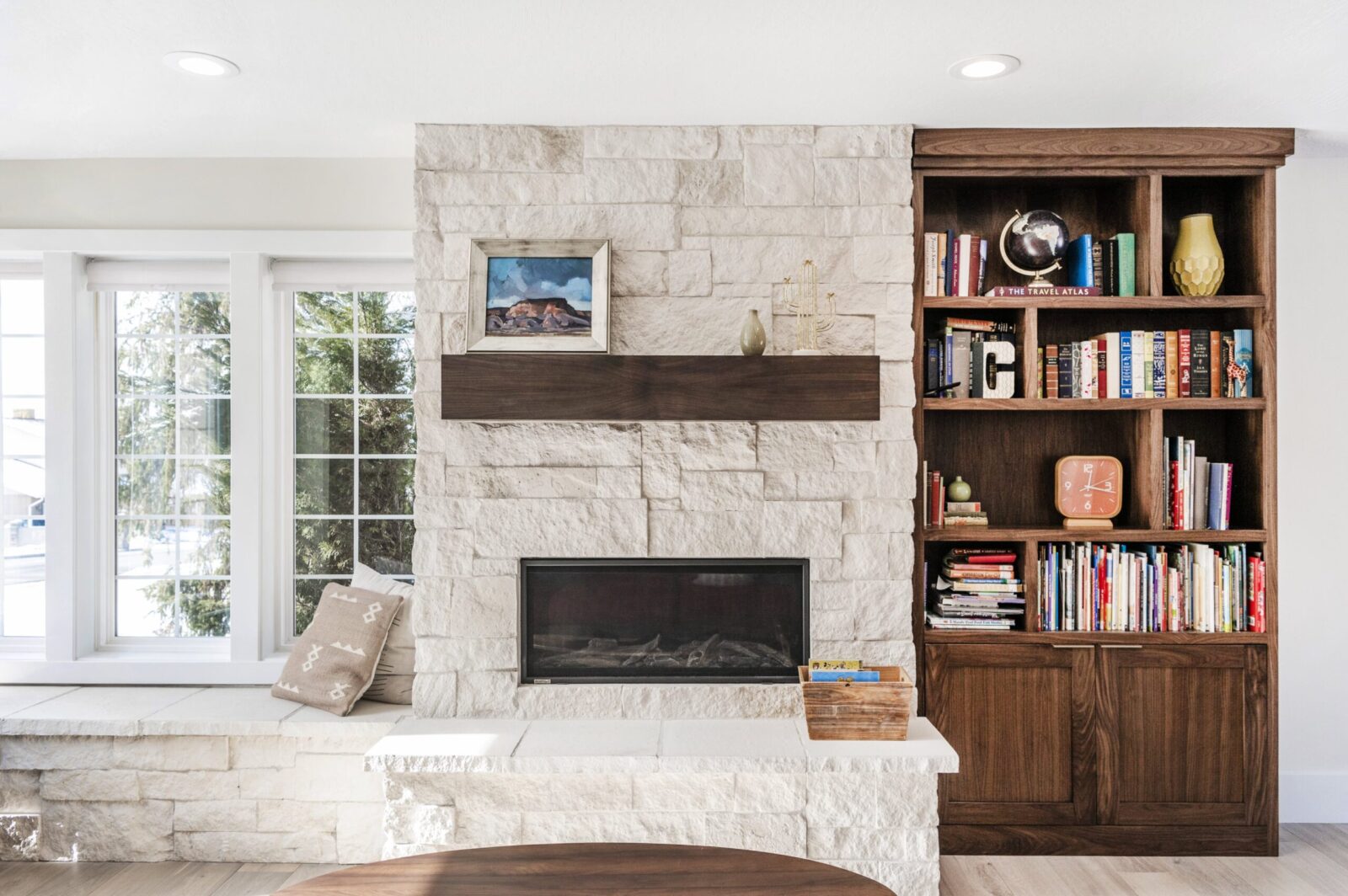 Custom built-in bookcase and mantel in a UT