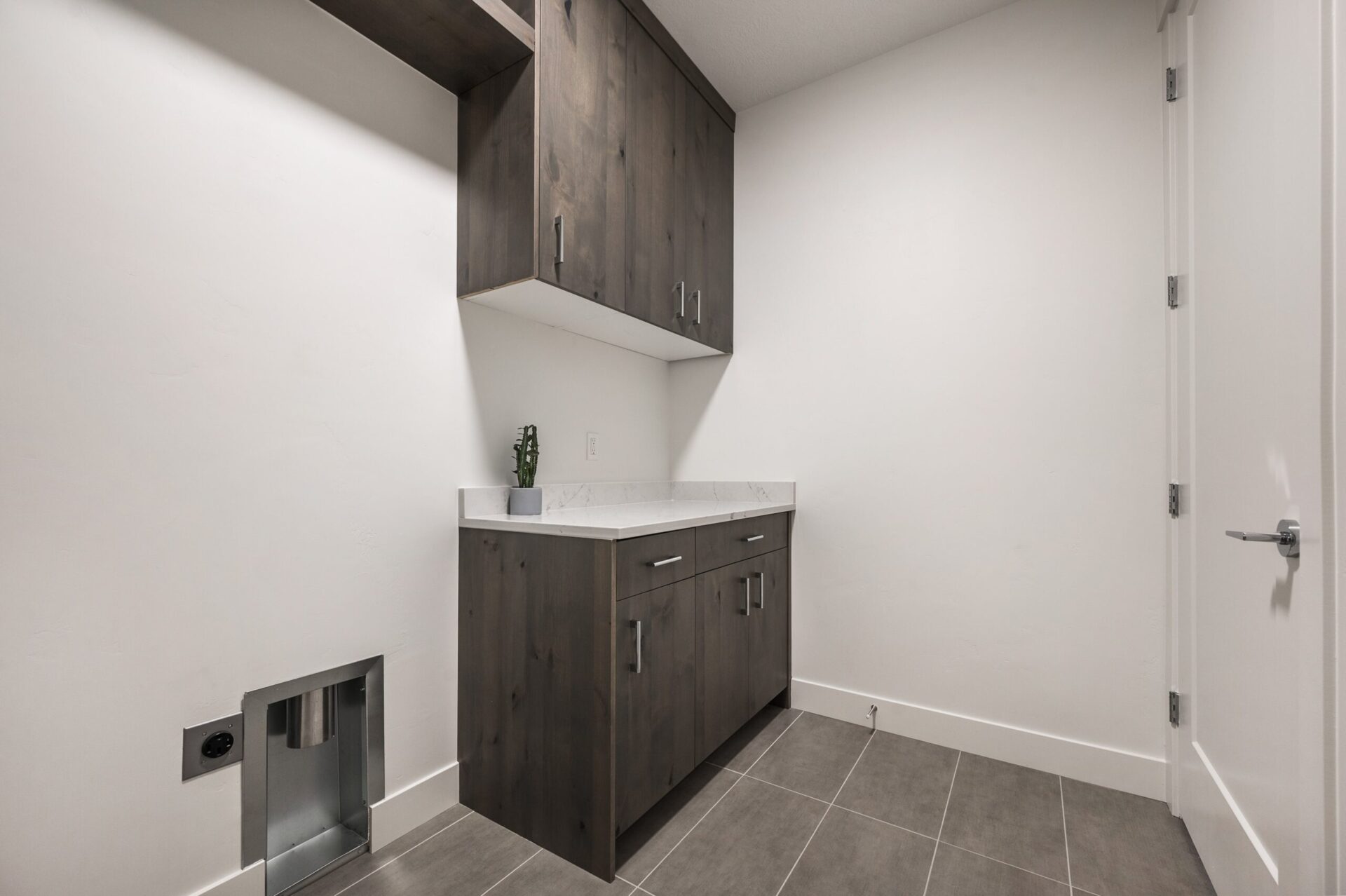 Laundry room with custom cabinets in Utah